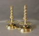 A pair of large brass candlesticks in the style baroque.5000m2 showroom.
