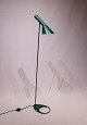 Green floor lamp designed by Arne Jacobsen in 1960 and manufactured by Louis Poulsen.5000m2 showroom.