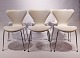 A set of 6 Seven chairs, model 3107, in white leather, designed by Arne Jacobsen and Fritz Hansen.5000m2 showroom.